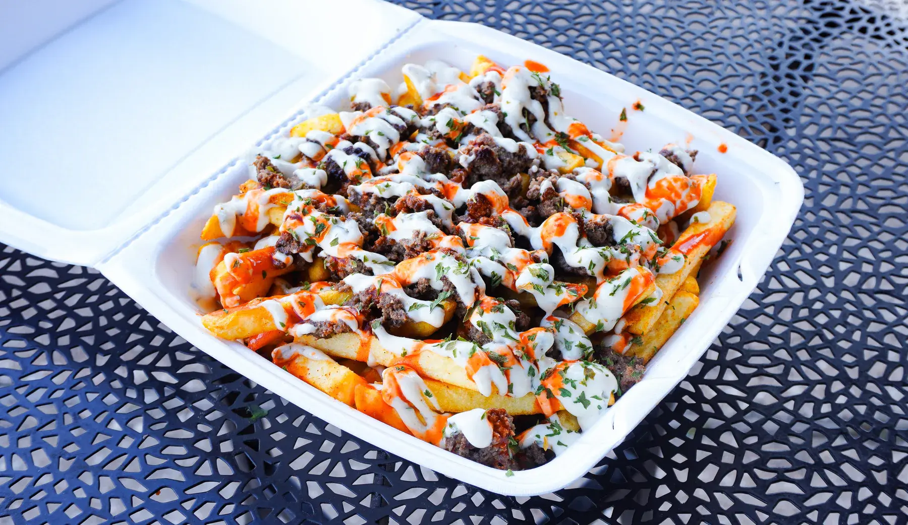 Metaverse Monster Fries loaded with beef and FOMO sauce